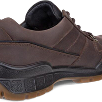 A dark brown leather lace-up shoe with a thick black midsole and a brown rubber outsole, shown from a three-quarters angle on a white background.