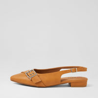 A single tan suede slingback flat shoe with a pointed toe and a silver-tone double-buckle detail on the vamp, shown against a light gray background.