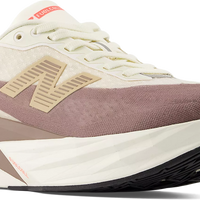 Women's New Balance Fuelcell Rebel V5 Medium in Angora/ Earth Shadow/ Sea Salt. Sku: WFCXLJ5-B
