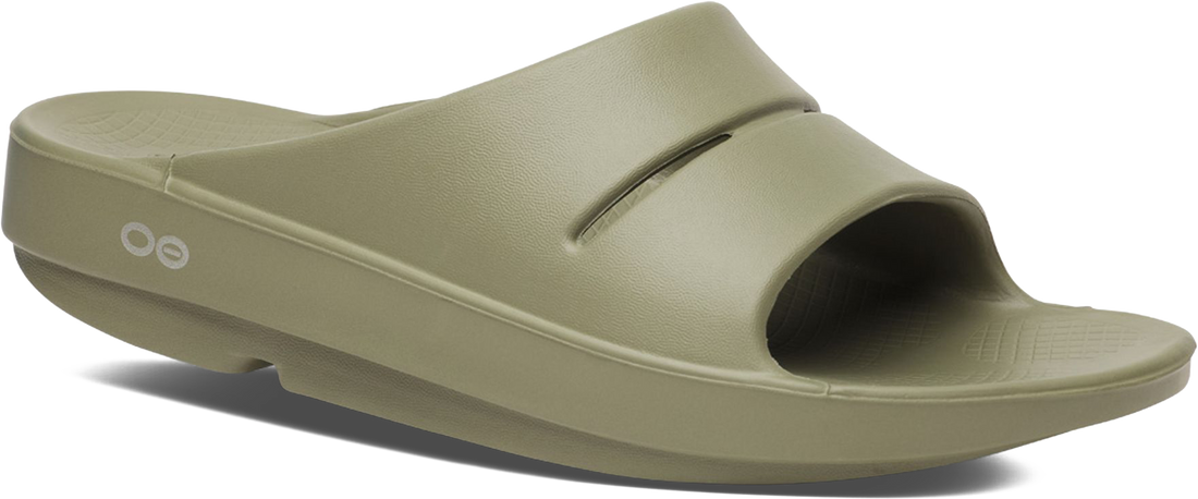 Green slide sandal on a white background