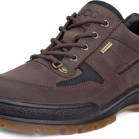 A dark brown leather lace-up shoe with black accents, a small gold-tone metal badge on the side, and a brown outsole, shown against a plain white background.